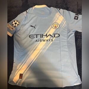 Puma Light Blue Apparel with Gold Logo